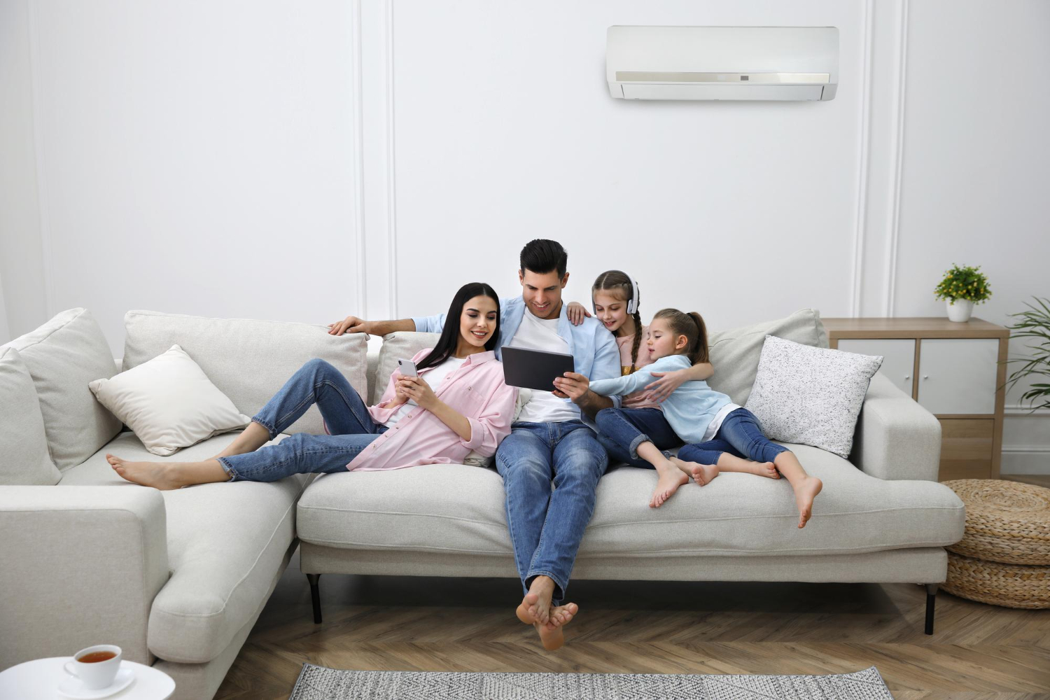 family comfortable at home with ac